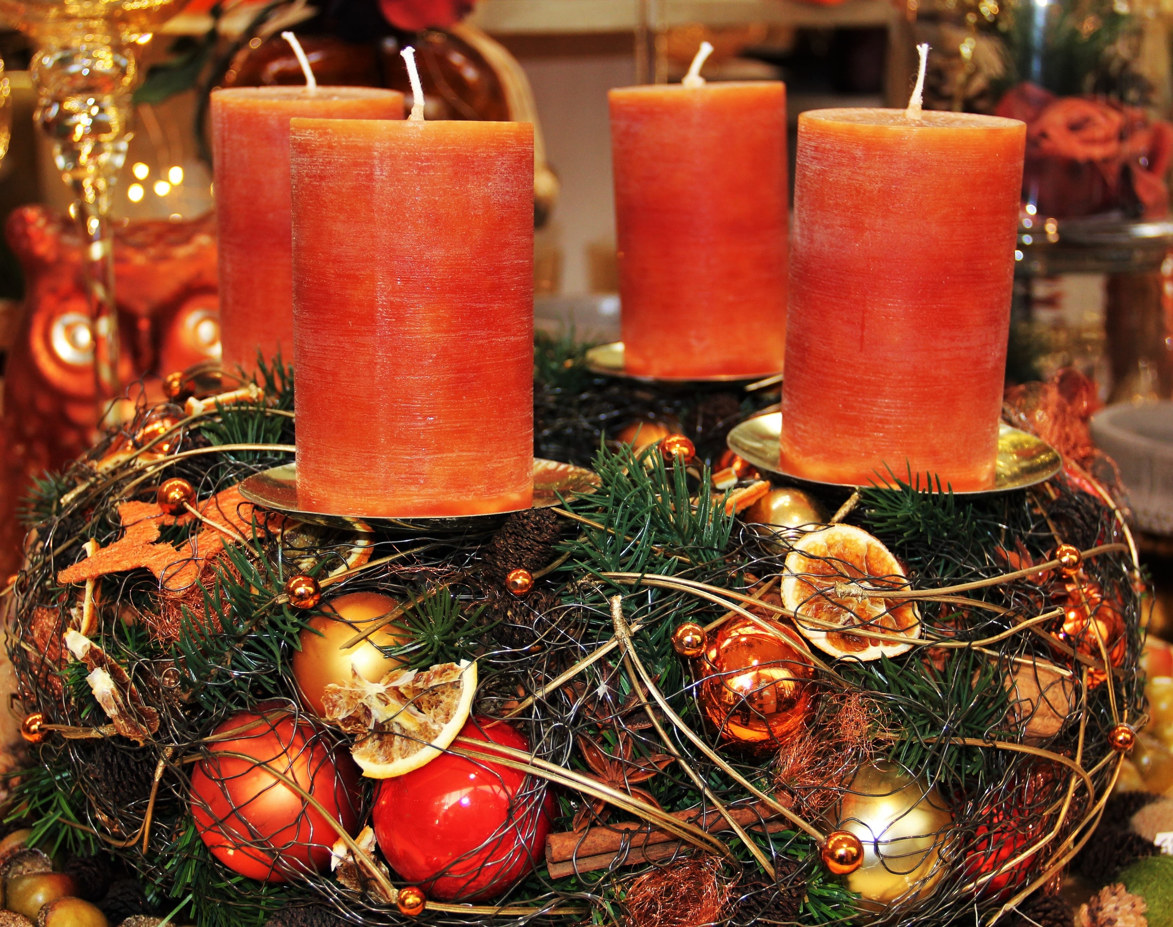 4 orange pillar candles