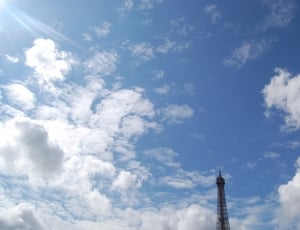 gray metal tower during daytime thumbnail