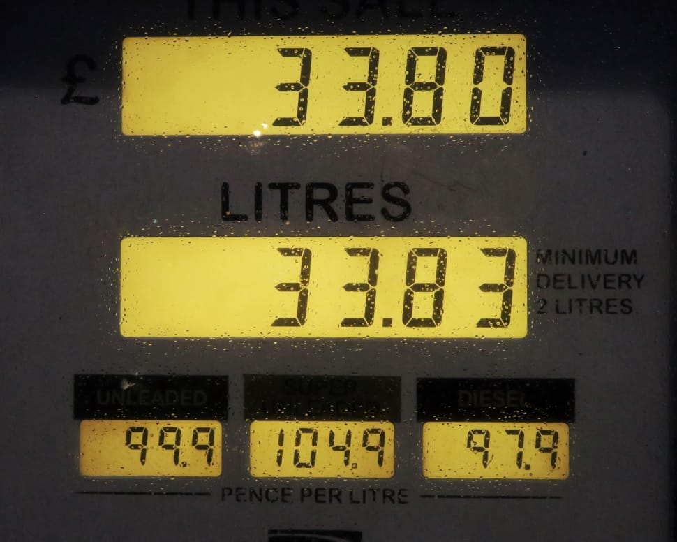 black gasoline station monitor at 33.80 and 33.83 litter 99.9 104.9 97.9 pence per litre preview