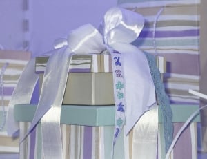 white beige and purple box with ribbon thumbnail