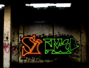 orange black and green graffiti thumbnail