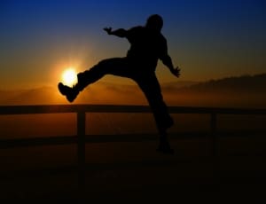 silhouette photo of man jumping thumbnail