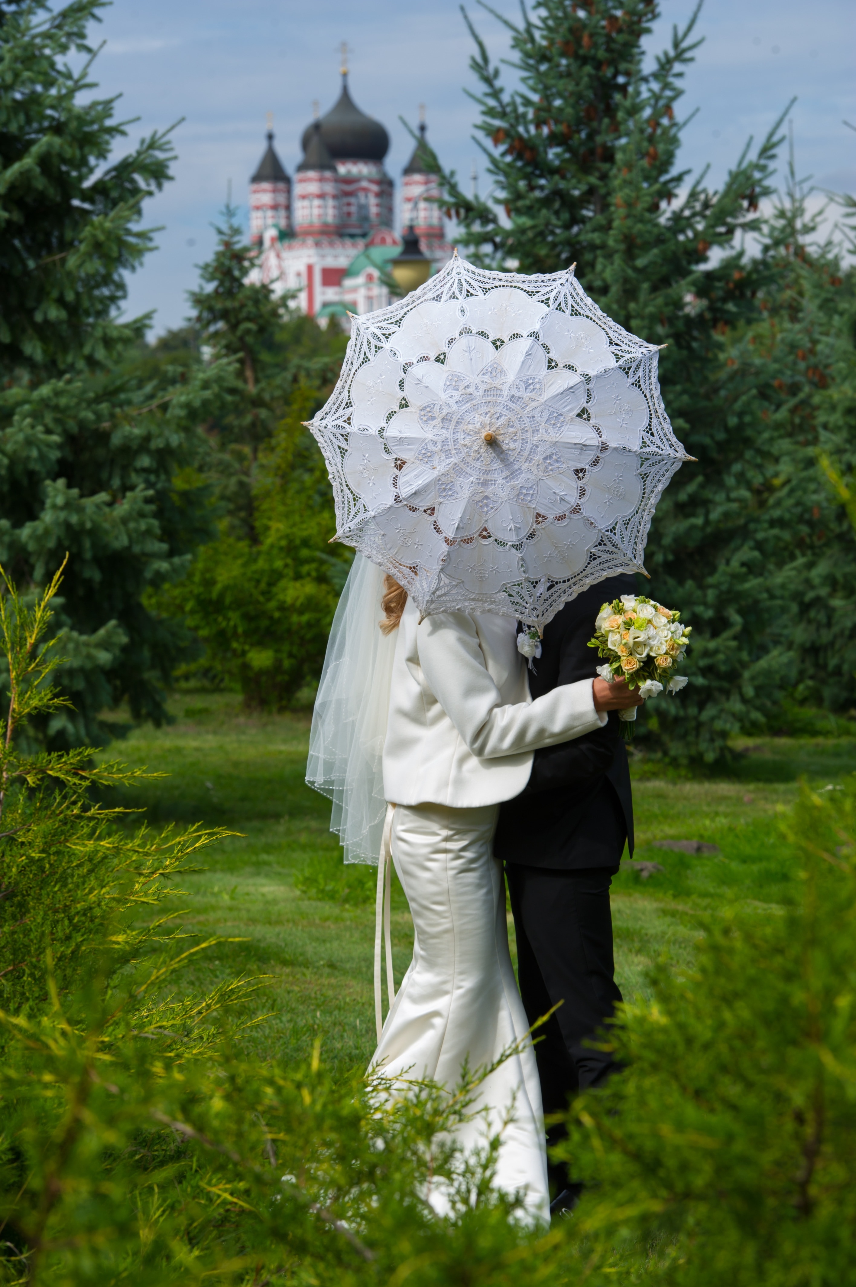 man in woman in white and black suit photo