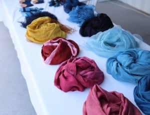 assorted color of scarfs thumbnail