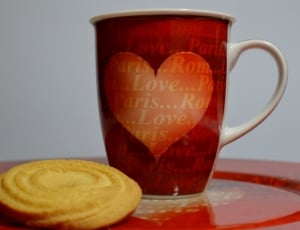 red and orange heart print ceramic mug thumbnail