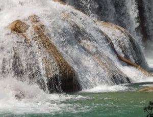 waterfalls impact on rock photography thumbnail