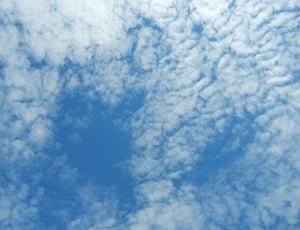 high angle photography of blue skies with clouds during daytime thumbnail