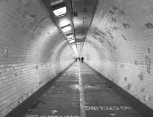 grayscale photo of tunnel thumbnail