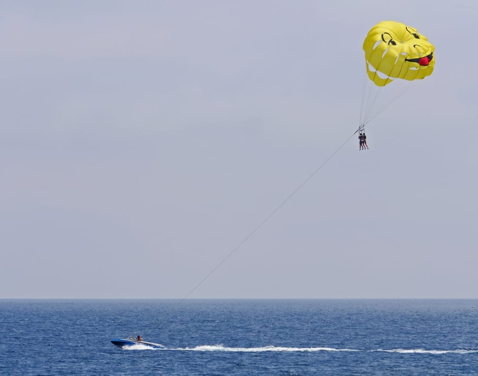 two person parasailing during cloudy skies preview