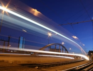 time lapse photo of train railways thumbnail
