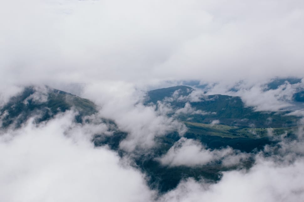 aerial photography of green mountains with white clouds preview