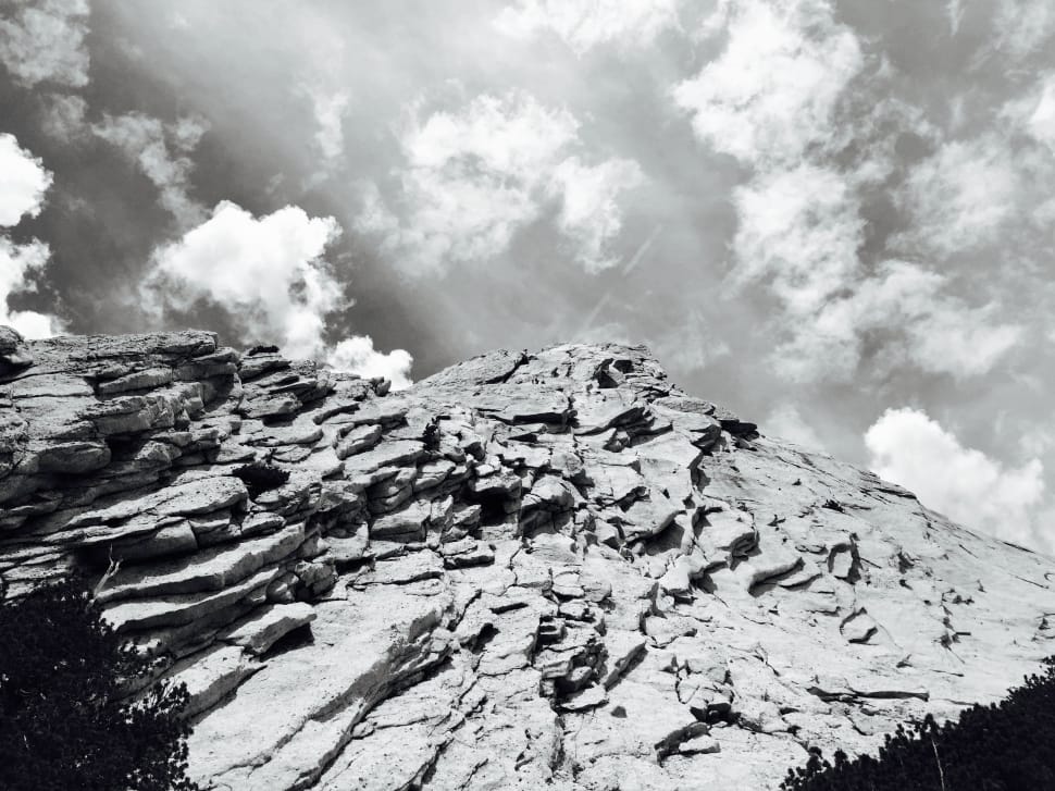 greyscale photography of rocky mountain during daytime preview