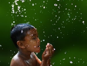 photo of boy with water droplets thumbnail