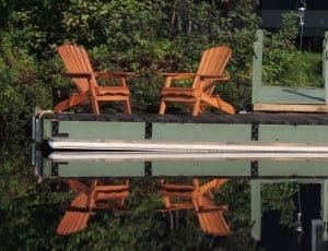2 orange wooden adirondack chair thumbnail