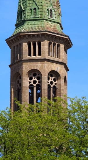 photograph of brown and green tower thumbnail