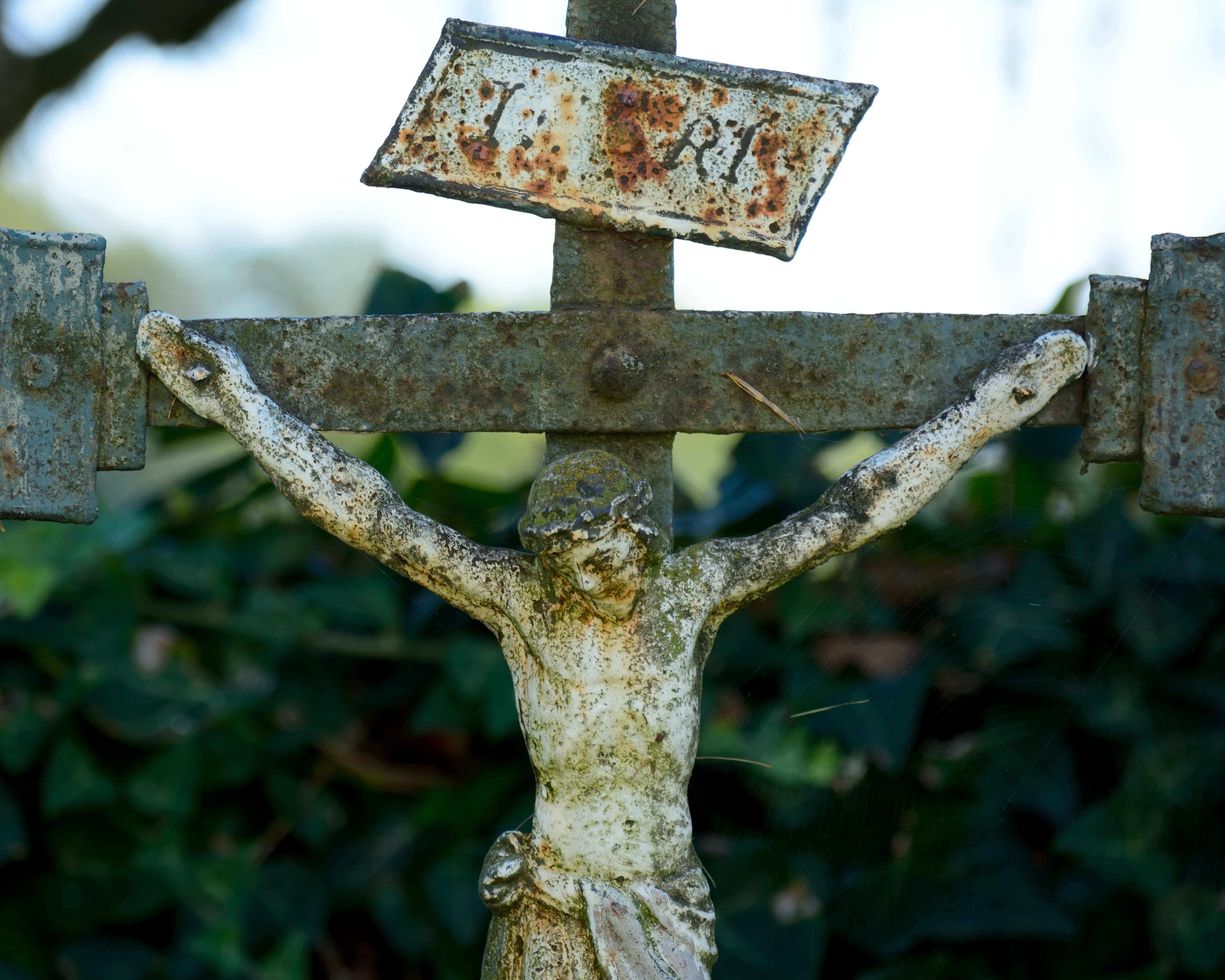crucifix metal statue