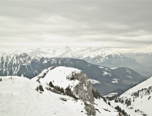 black and grey mountain with white snow thumbnail