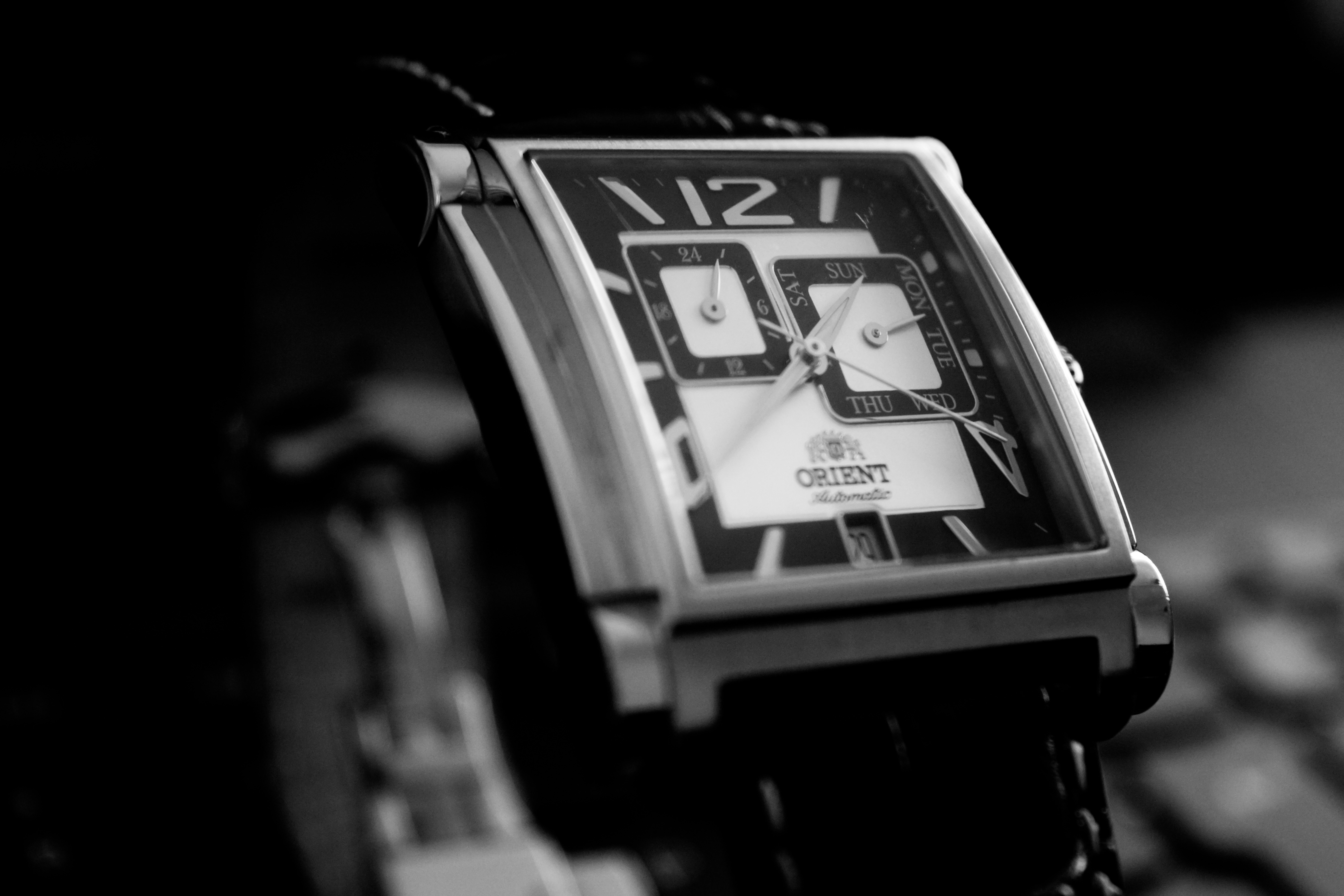 black strap silver chronograph watch