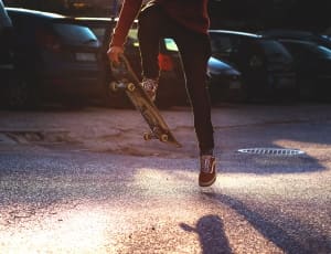 men's red skater shoes and skateboard thumbnail