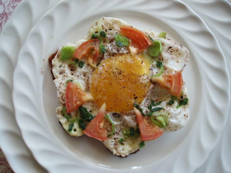sunny side up with red tomato and green leaf vegetables preview