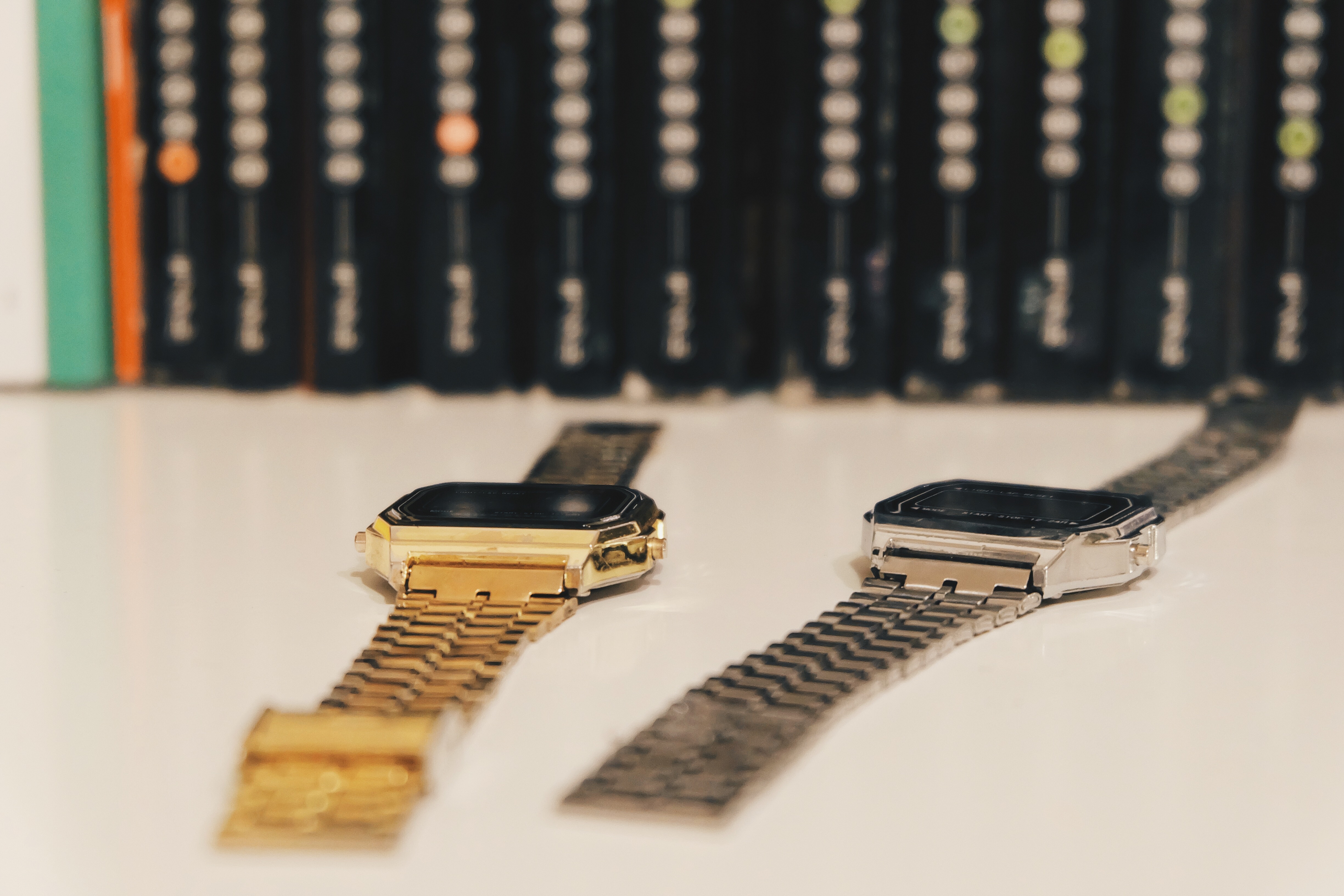gold and silver link watches