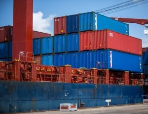 red and blue intermodal containers pile thumbnail