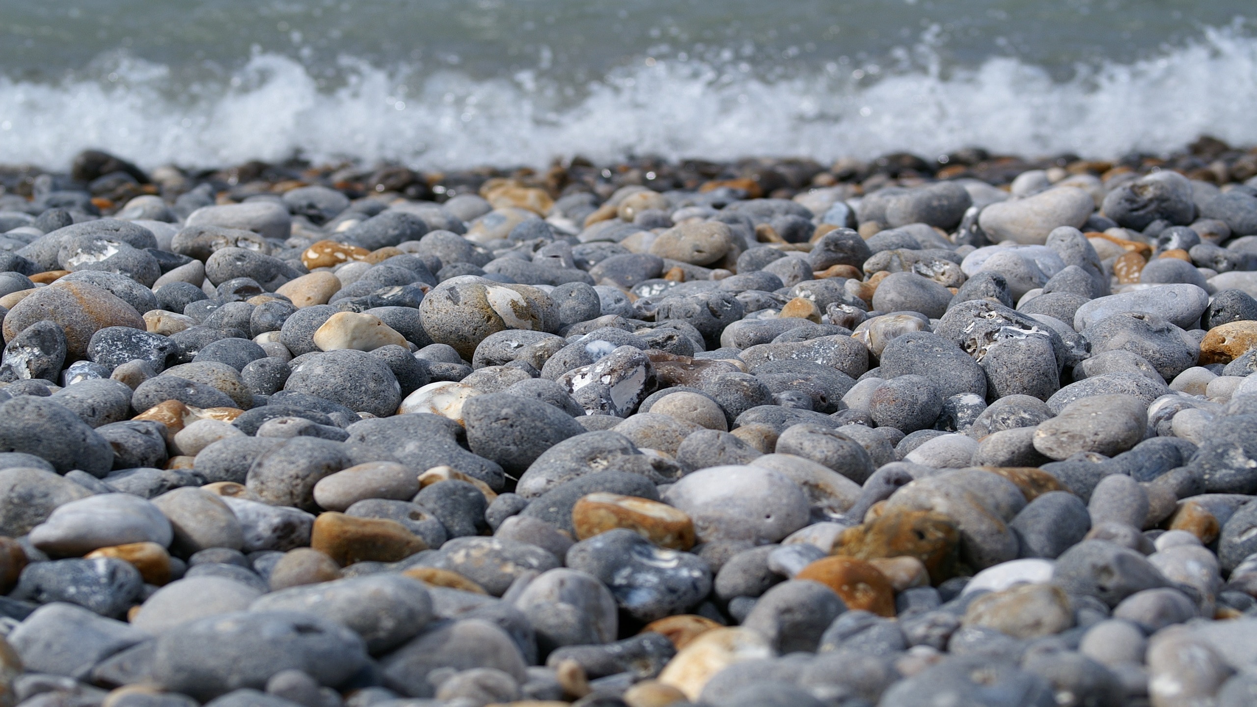 photo of gray stones near seashore