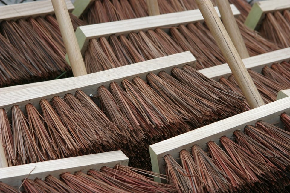 brown brooms next to each other preview