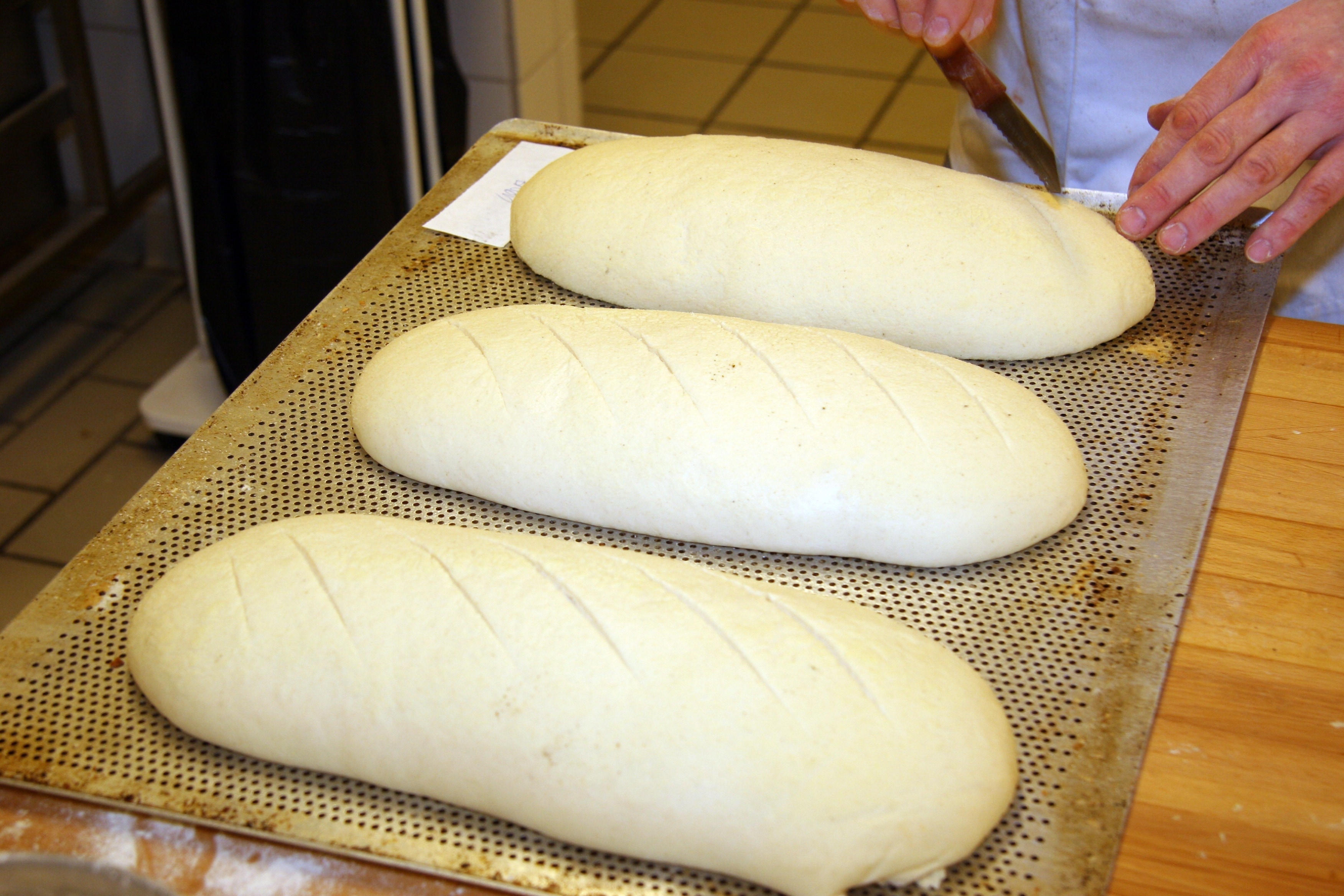 3 white oblong dough