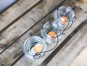 three clear glass candle holders thumbnail