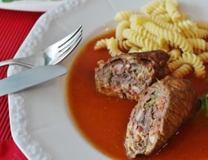 meat with sauce and pasta with cherry tomato thumbnail