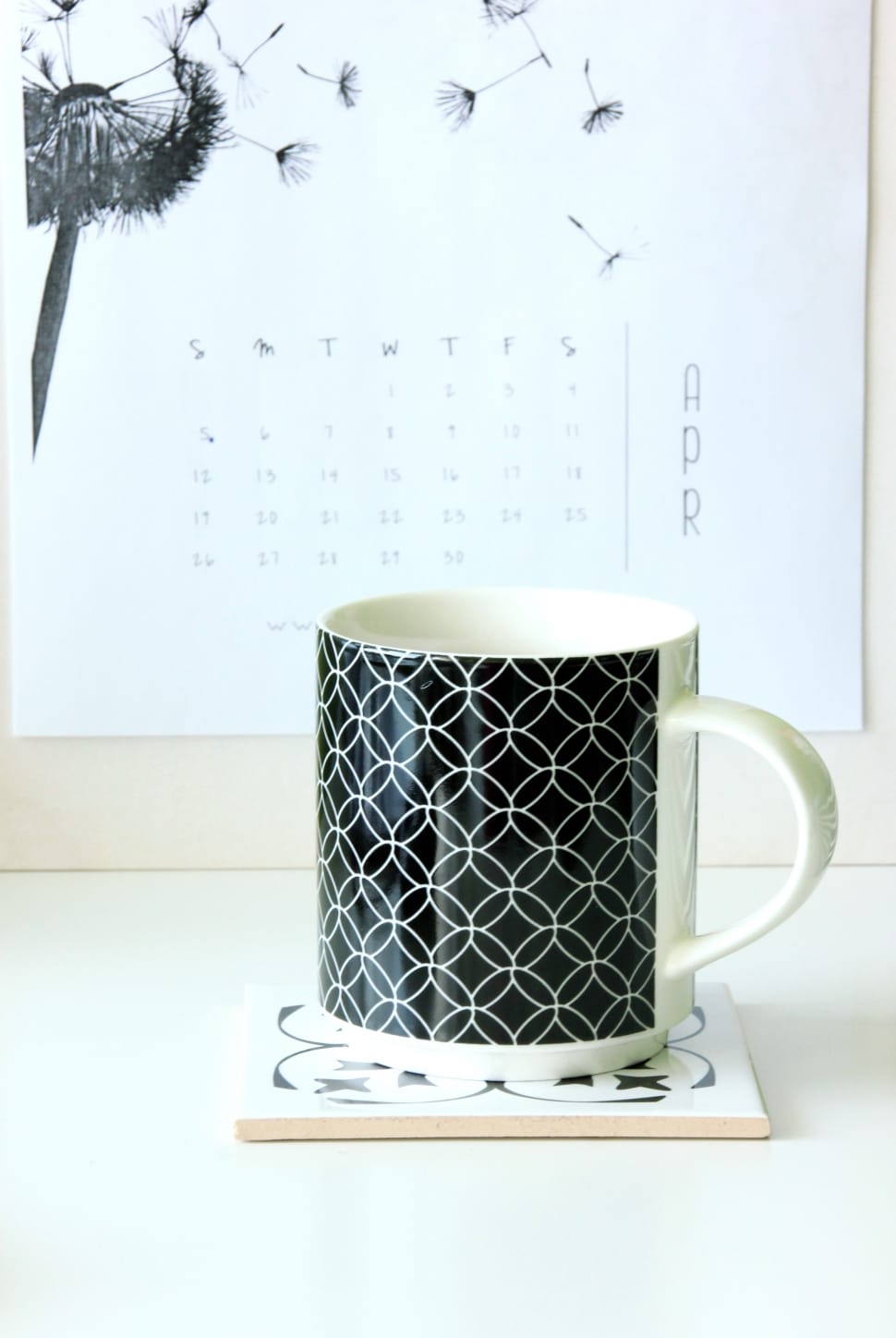 white and black ceramic mug preview