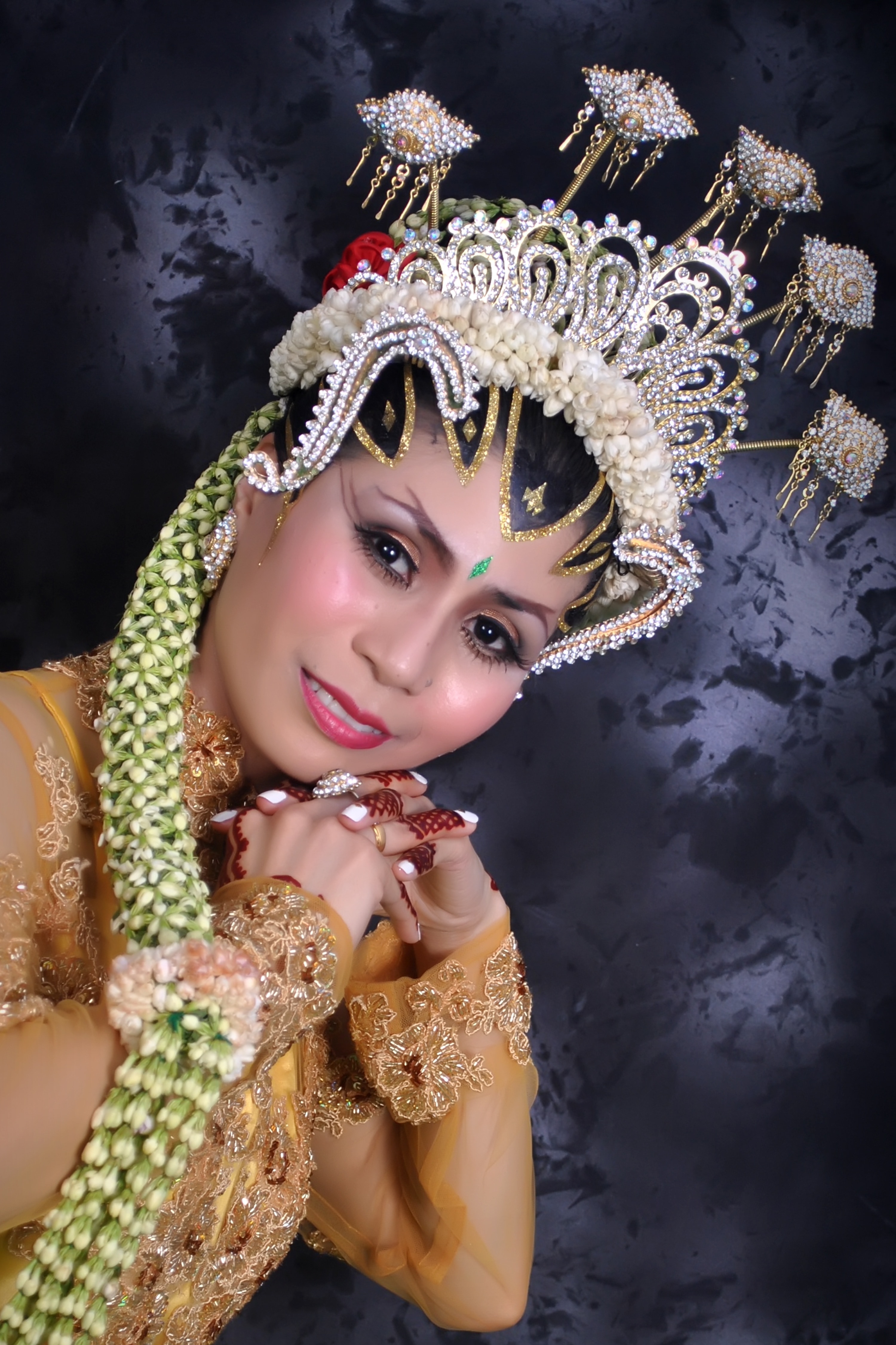 photo of woman wearing beaded crown