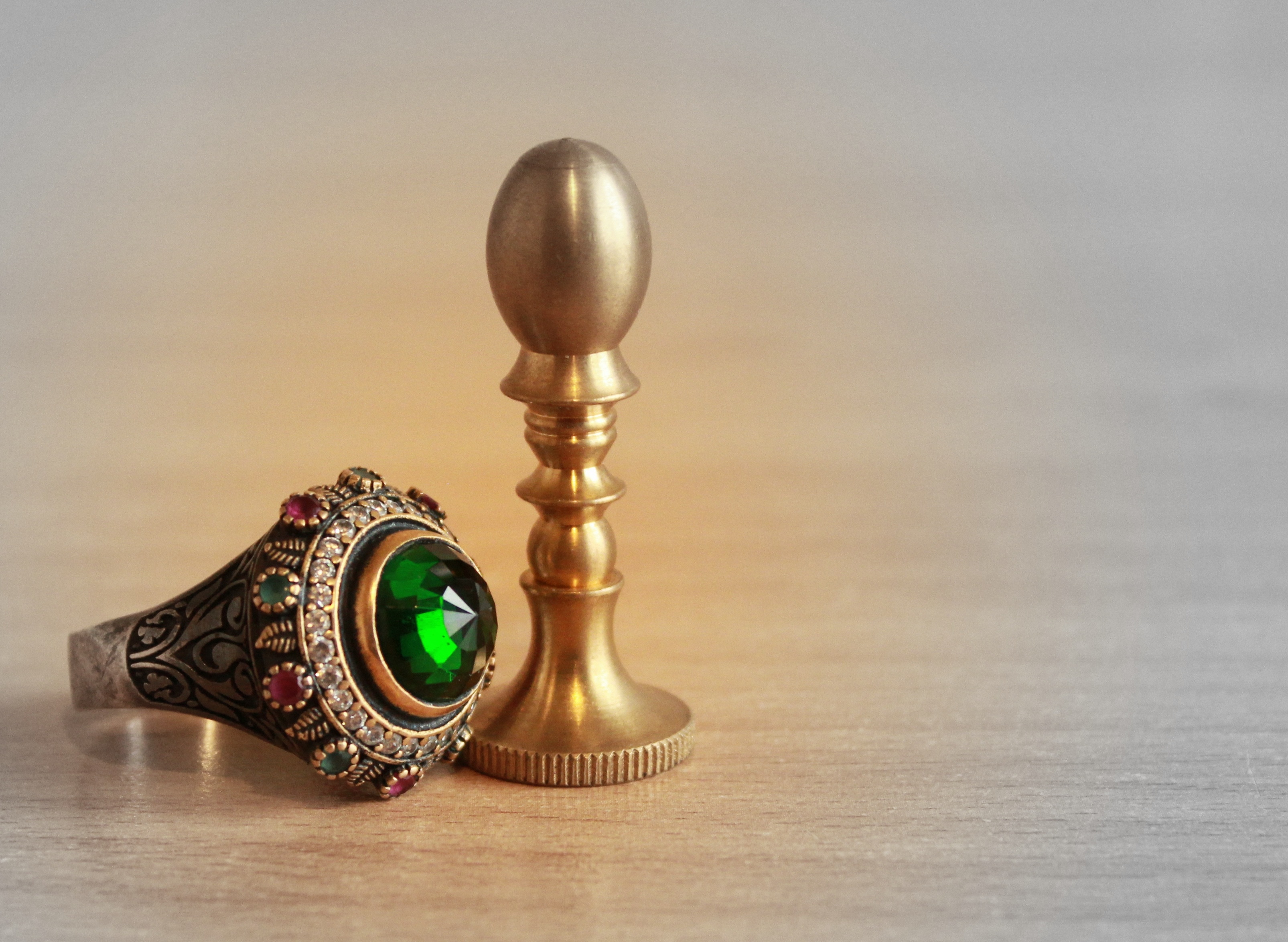 green gemstone gold ring