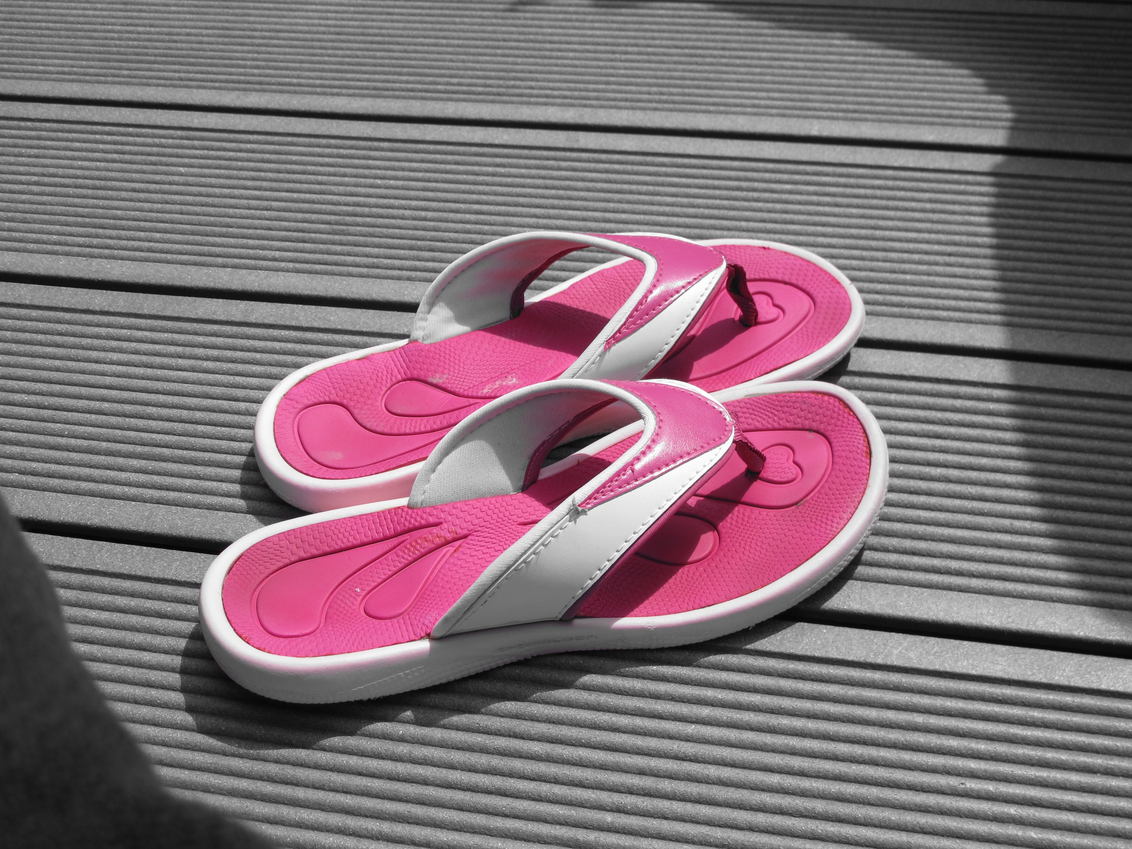 white-and-pink flipflops