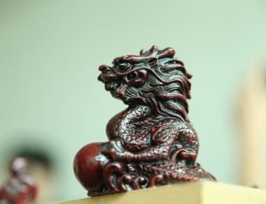 brown ceramic dragon figurine thumbnail