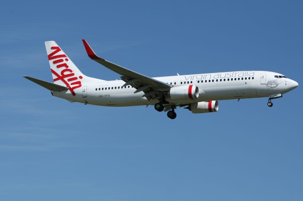 white virgin austrailia commercial airplane taking flight preview