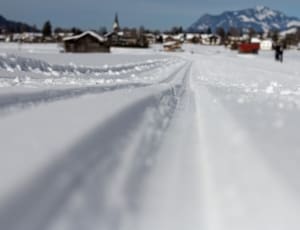 focus photo of snow road thumbnail