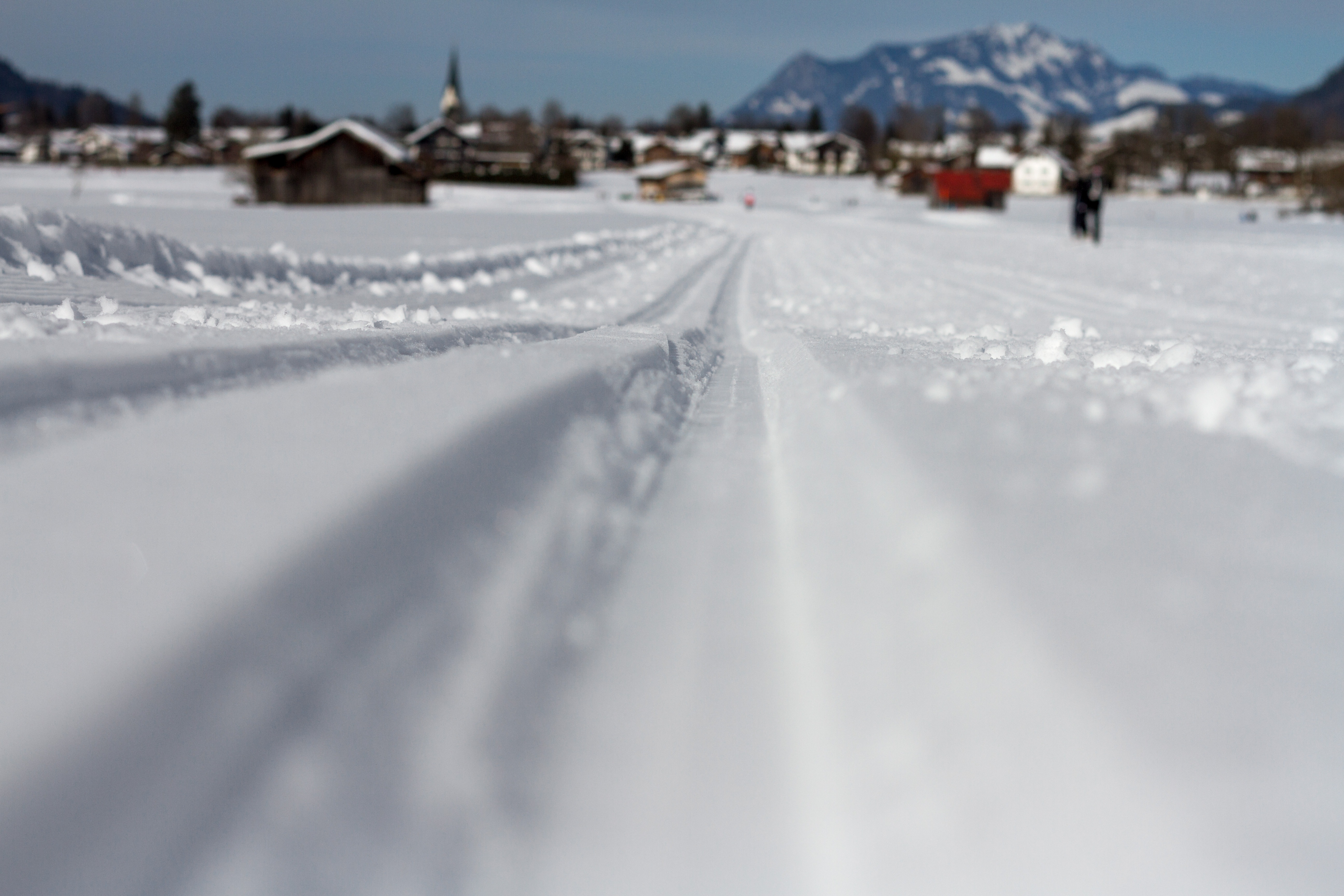 focus photo of snow road
