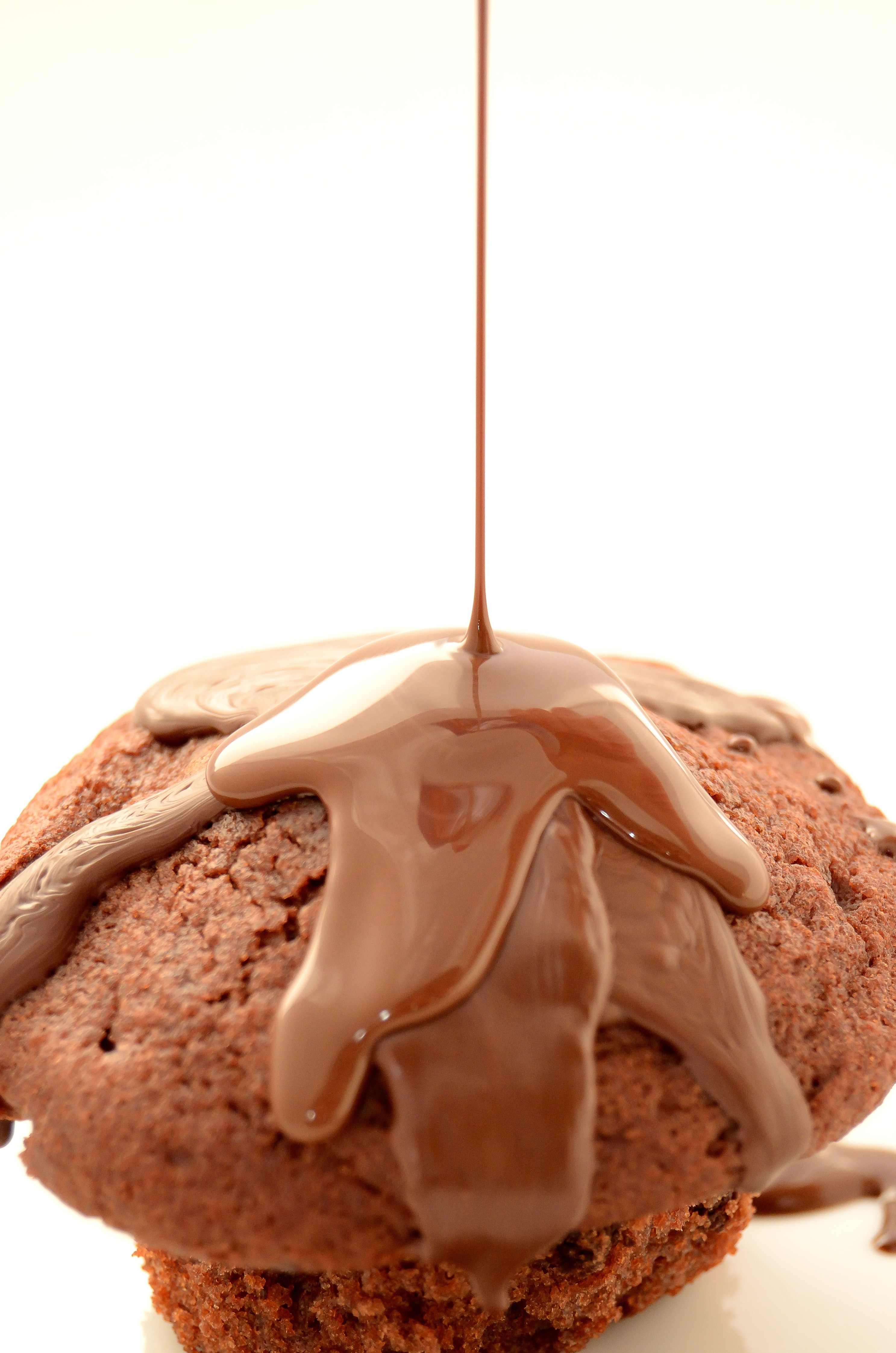 chocolate cupcake top with chocolate syrup