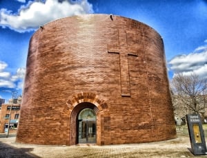 large brown cylindrical cathedral building thumbnail