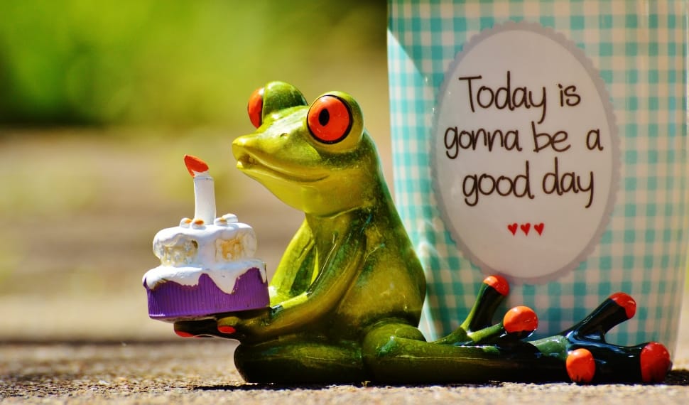 green ceramic frog with cake figurine preview
