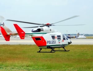white and red polizei helicopter thumbnail