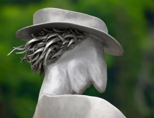 white human face shape with hat sculpture thumbnail
