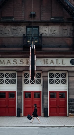 white brown black and red mass hall building thumbnail