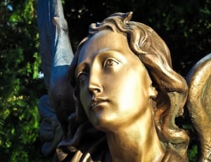 brass woman statue thumbnail