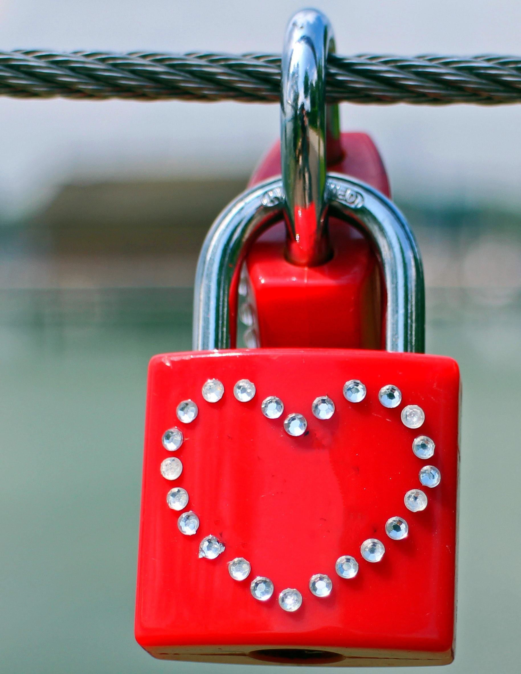 red and silver padlock