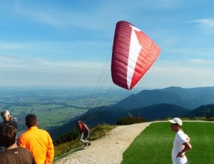 red and white paragliding thumbnail