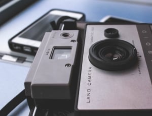 black and gray polaroid land camera thumbnail