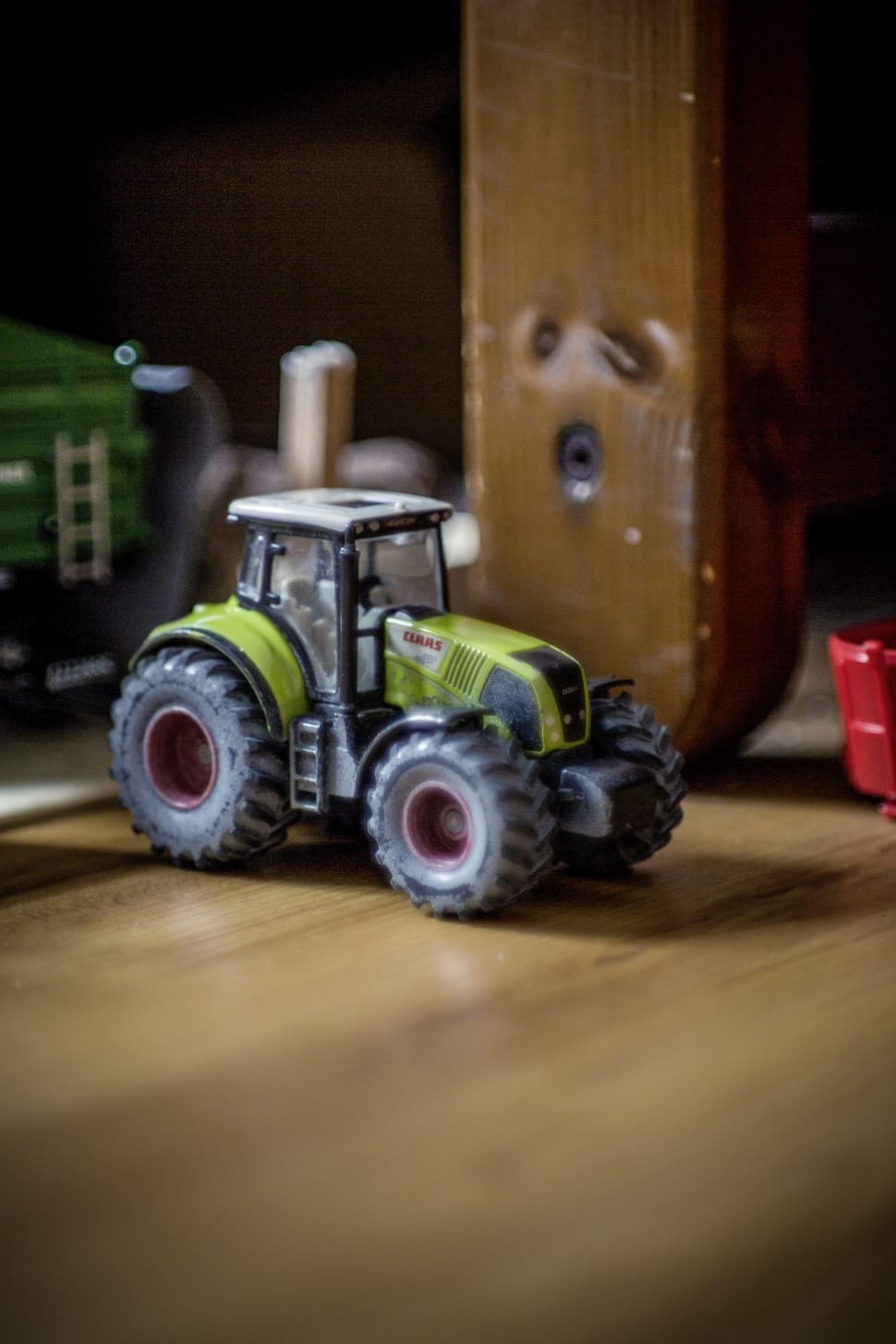 selective photography of gray tractor toy preview
